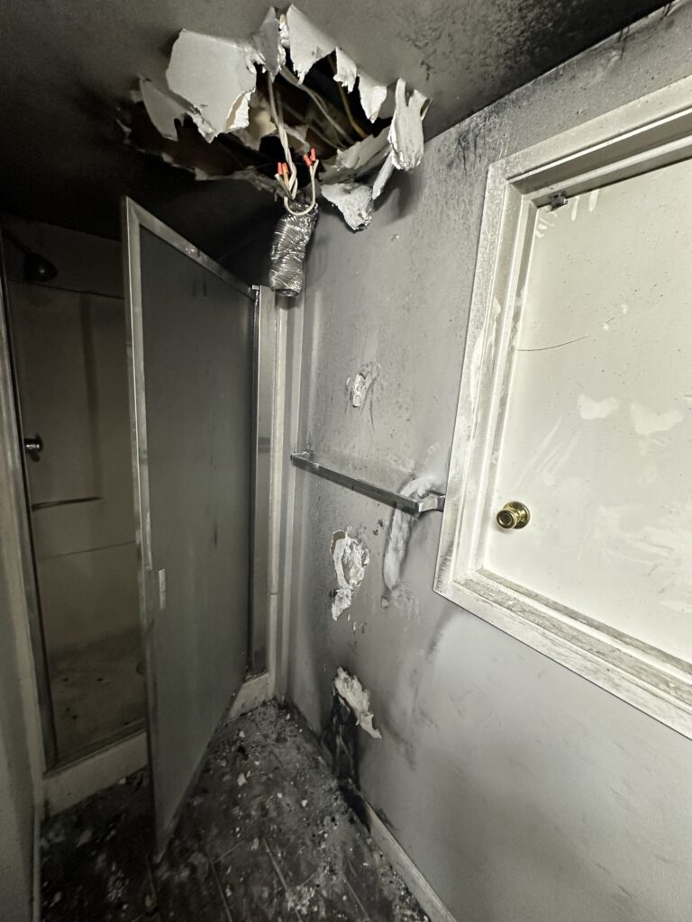 House fire collapses ceiling in bathroom